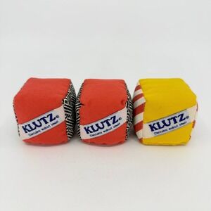 Klutz Juggling Cubes Bean Bags Set of 3 Red Yellow Walnut Shell Filled Skill Toy